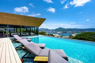 3 outdoor pools, open 7:00 AM to 10:00 PM, pool umbrellas