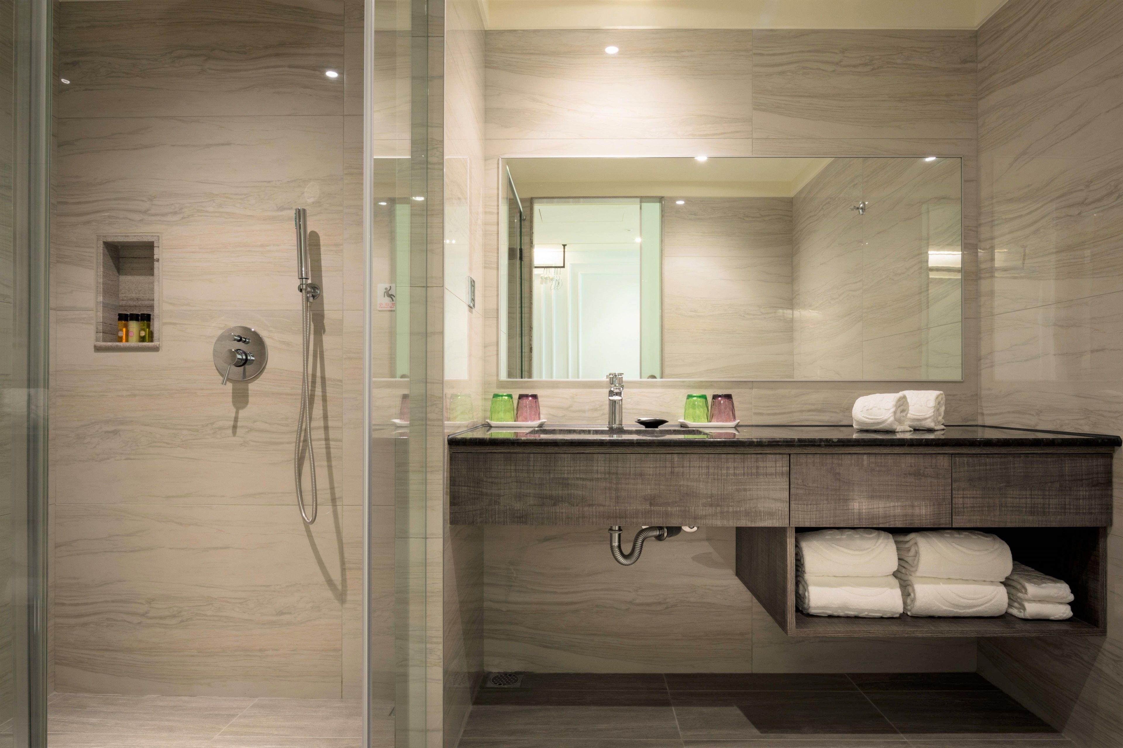 deluxe quadruple room, 2 double beds, bathtub, tower | bathroom | shower, rainfall showerhead, hair dryer, slippers