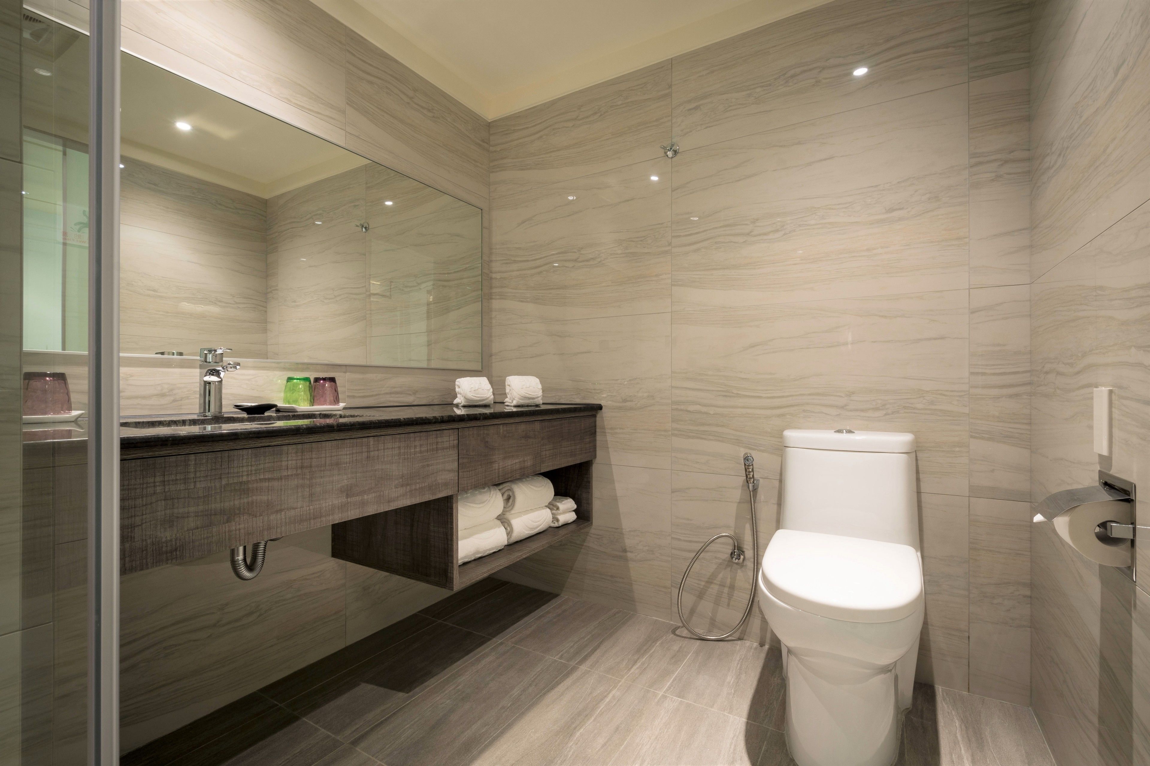 twin room | bathroom | shower, rainfall showerhead, hair dryer, slippers