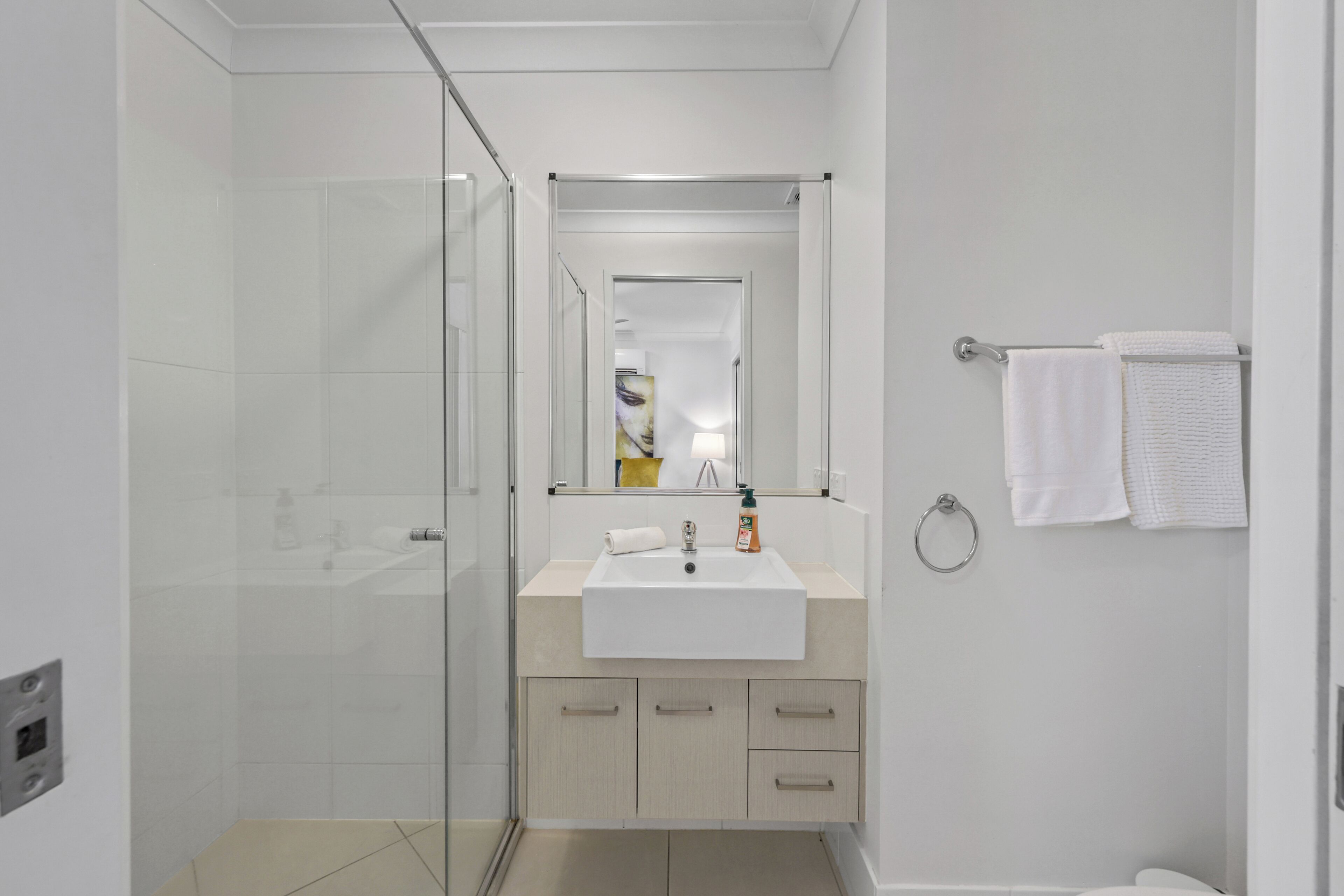 Combined shower/bathtub, hair dryer, towels, soap