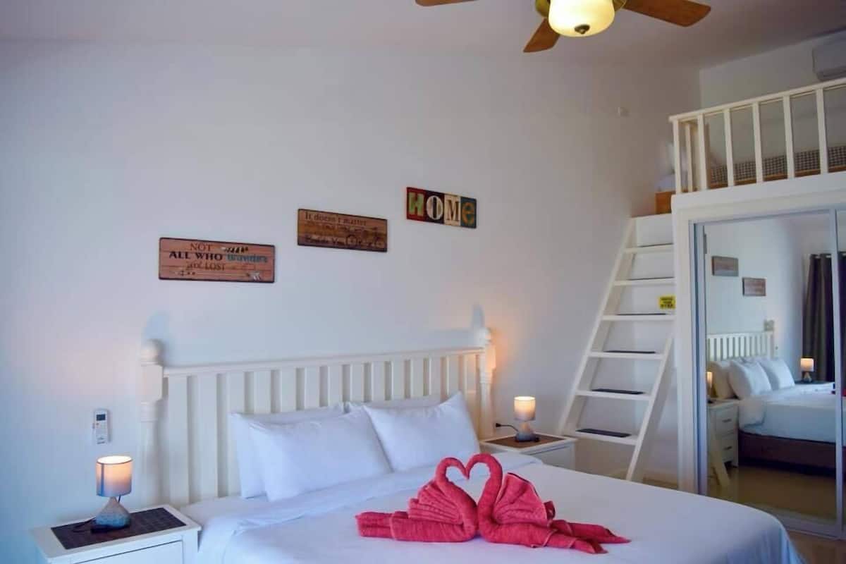 Executive Studio Suite, 1 King Bed, Non Smoking, Pool View | In-room safe, individually decorated, individually furnished, desk