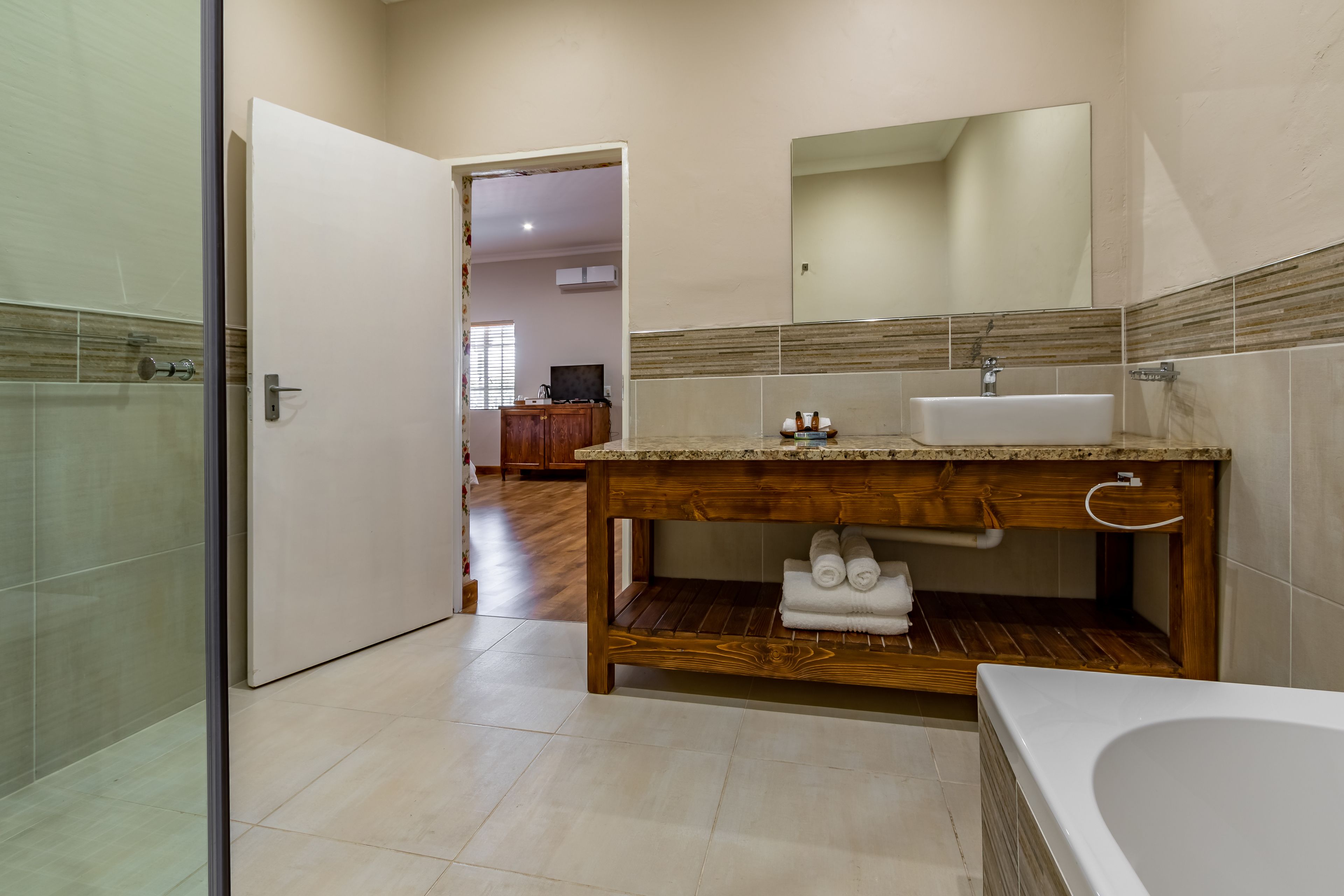 luxury double or twin room, 2 single beds | bathroom | shower, rainfall showerhead, free toiletries, hair dryer