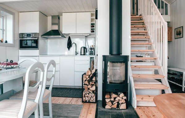 Fridge, stovetop, dishwasher, coffee/tea maker