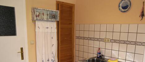 Fridge, coffee/tea maker, electric kettle, toaster