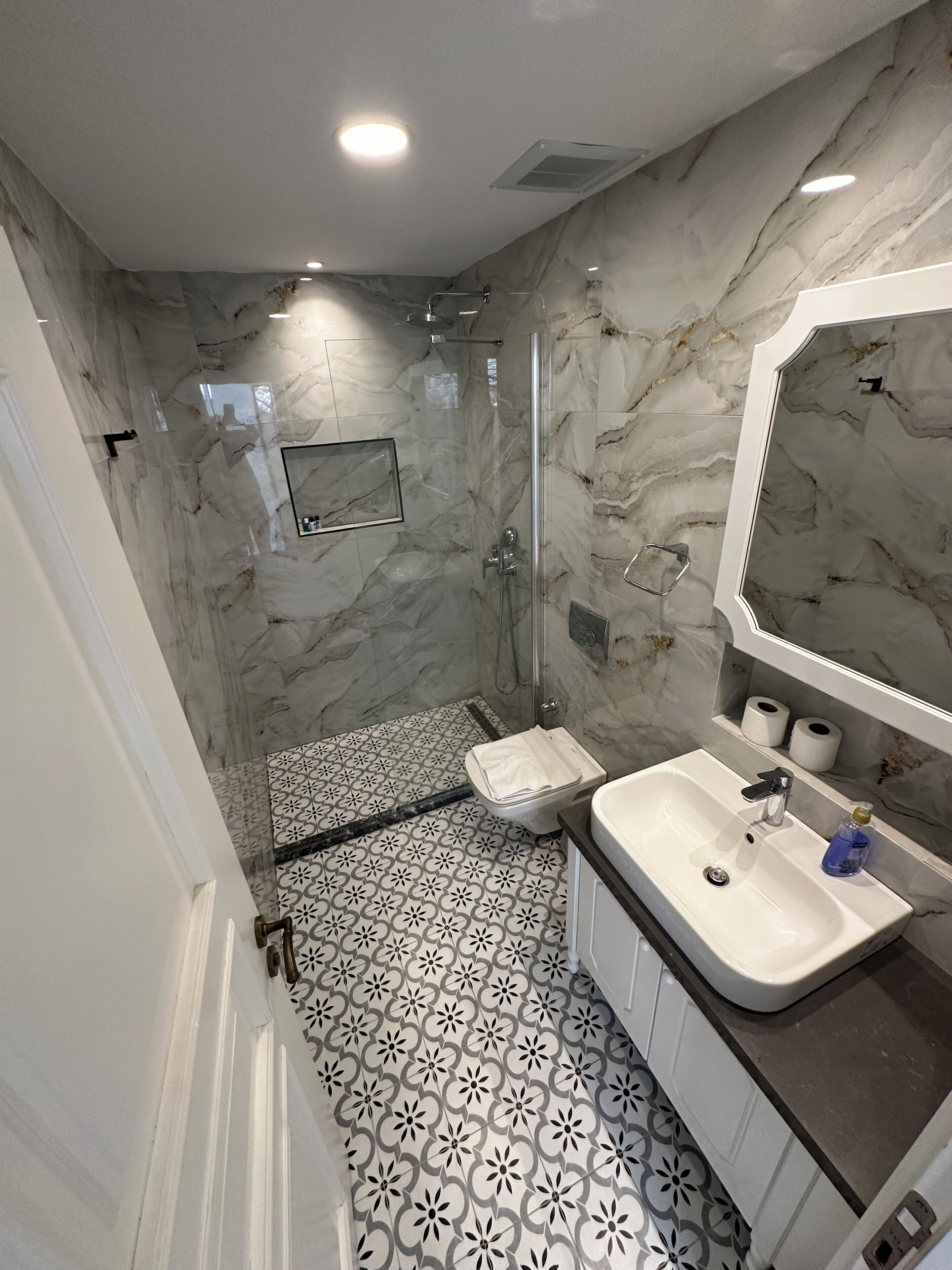 quadruple room, garden view | bathroom | shower, free toiletries, hair dryer, slippers