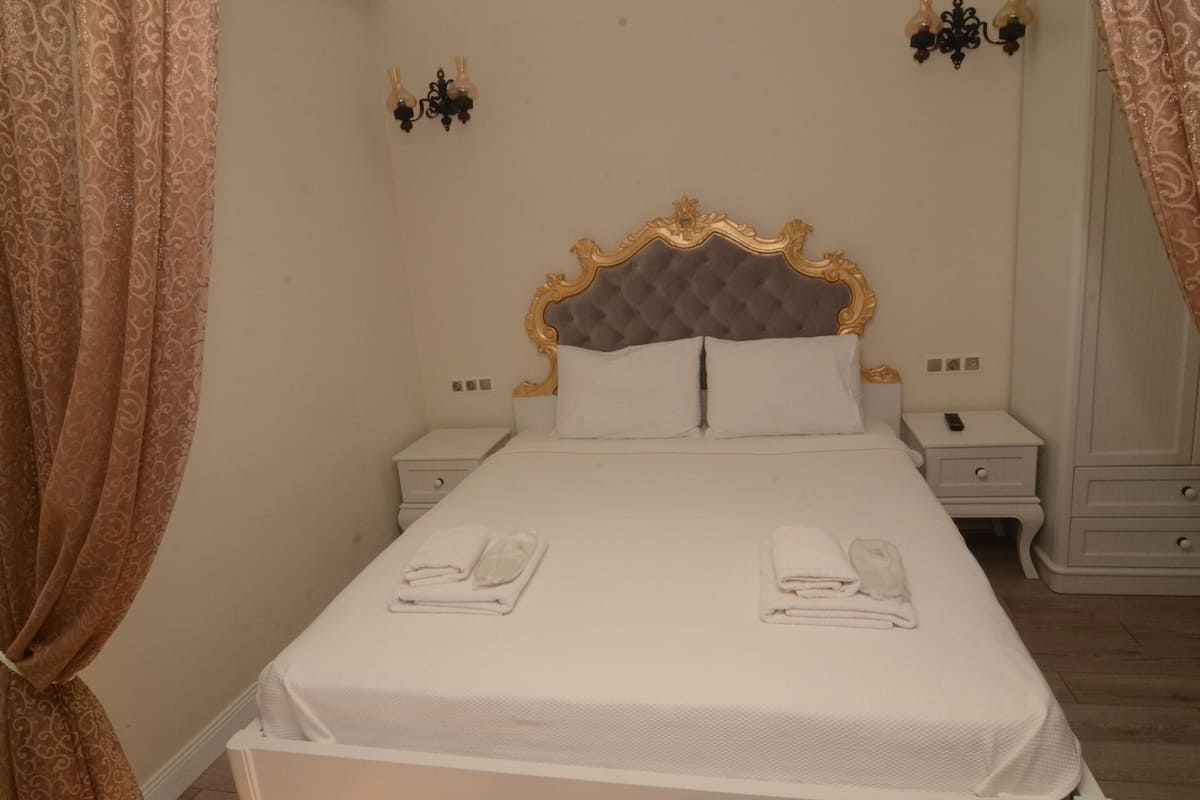 Habitación Deluxe | Ropa de cama de alta calidad, minibar, caja fuerte