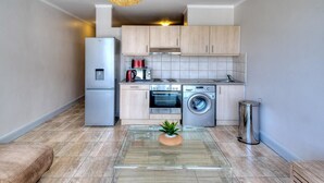 Apartment, 1 Bedroom | Private kitchen | Coffee/tea maker, fridge, microwave, oven - Four Seasons (Cape Town)