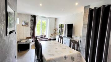 Comfort House, 3 Bedrooms | Living area | 160-cm flat-screen TV with satellite channels, pay films