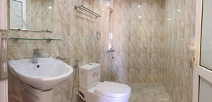 Shower, free toiletries, hair dryer, slippers