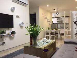 Apartemen | Area keluarga | TV layar datar