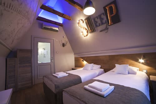Design Suite, 2 Bedrooms, Patio, City View (Heweliusz) | Hypo-allergenic bedding, minibar, in-room safe, individually decorated