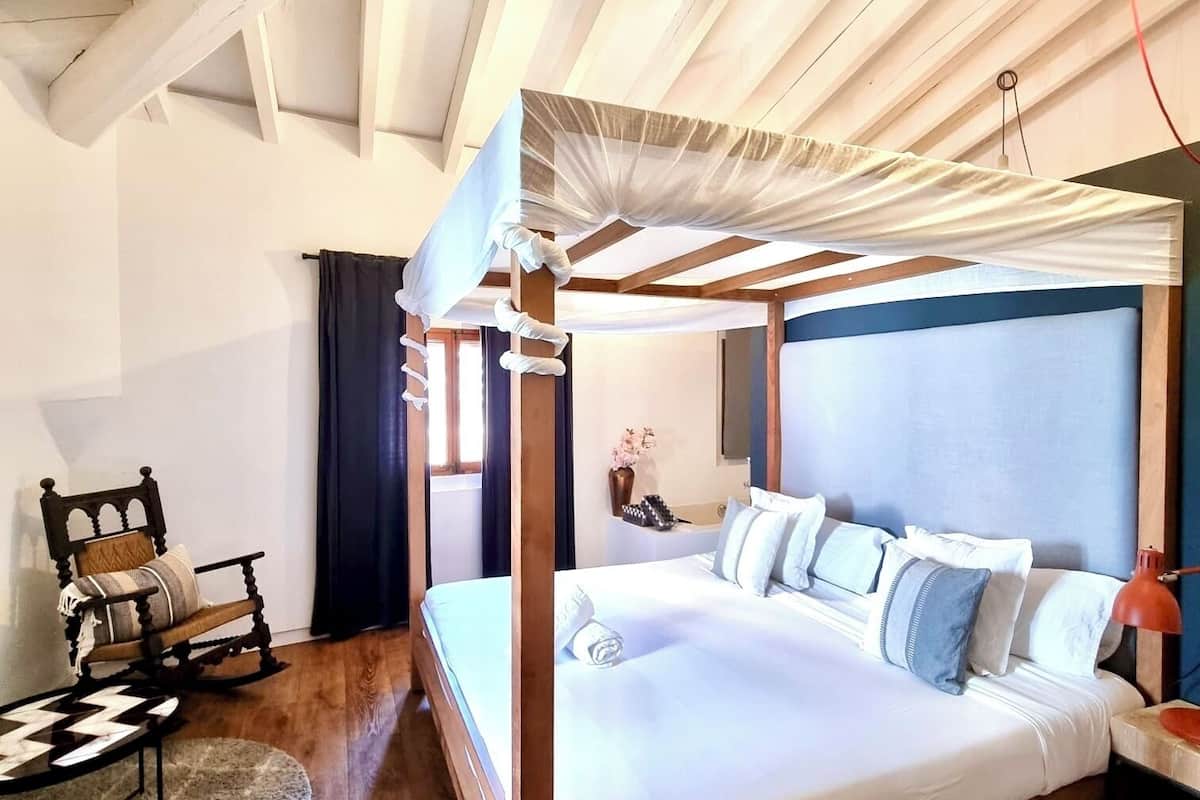 Suite | Ropa de cama de alta calidad y minibar