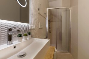 Romantic Room, 1 Queen Bed with Sofa bed, Private Bathroom, Ground Floor (Semi-basement) | Down comforters, memory foam beds, in-room safe, individually furnished - Martini Rooms Castello (Cagliari)