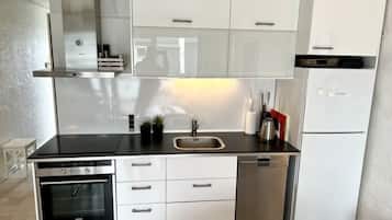 Apartment | Private kitchen | Fridge, oven, stovetop, electric kettle