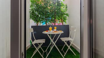 Suite superior, patio | Terraza o patio