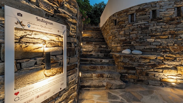 A stone staircase leading to a building with a signboard. - Palatiana Agriturismo Philoxenia Cottages Retreat (Naxos)