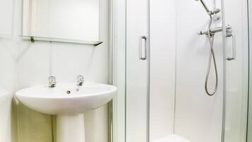 Standard Room, Multiple Beds (Family of 3) | Bathroom | Hair dryer, towels, toilet paper
