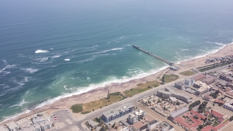 Beach nearby, beach umbrellas, beach towels, beach yoga
