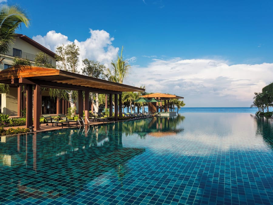 Outdoor pool, open 6:00 AM to 8:00 PM, pool umbrellas, sun loungers