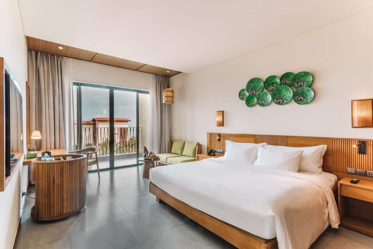 Habitación Deluxe, 1 cama King size, vista al océano | 1 habitación, ropa de cama de alta calidad y minibar