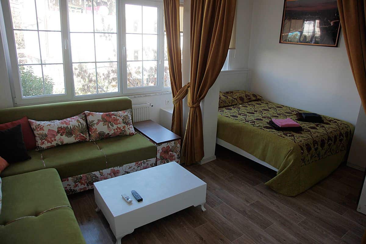 Standard Triple Room | Living area | LCD TV