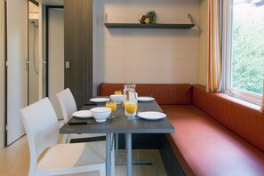 Basic Mobile Home, 2 Bedrooms | Living area - Camping Le Sous Bois (Saint-Maurice-d'Ibie)