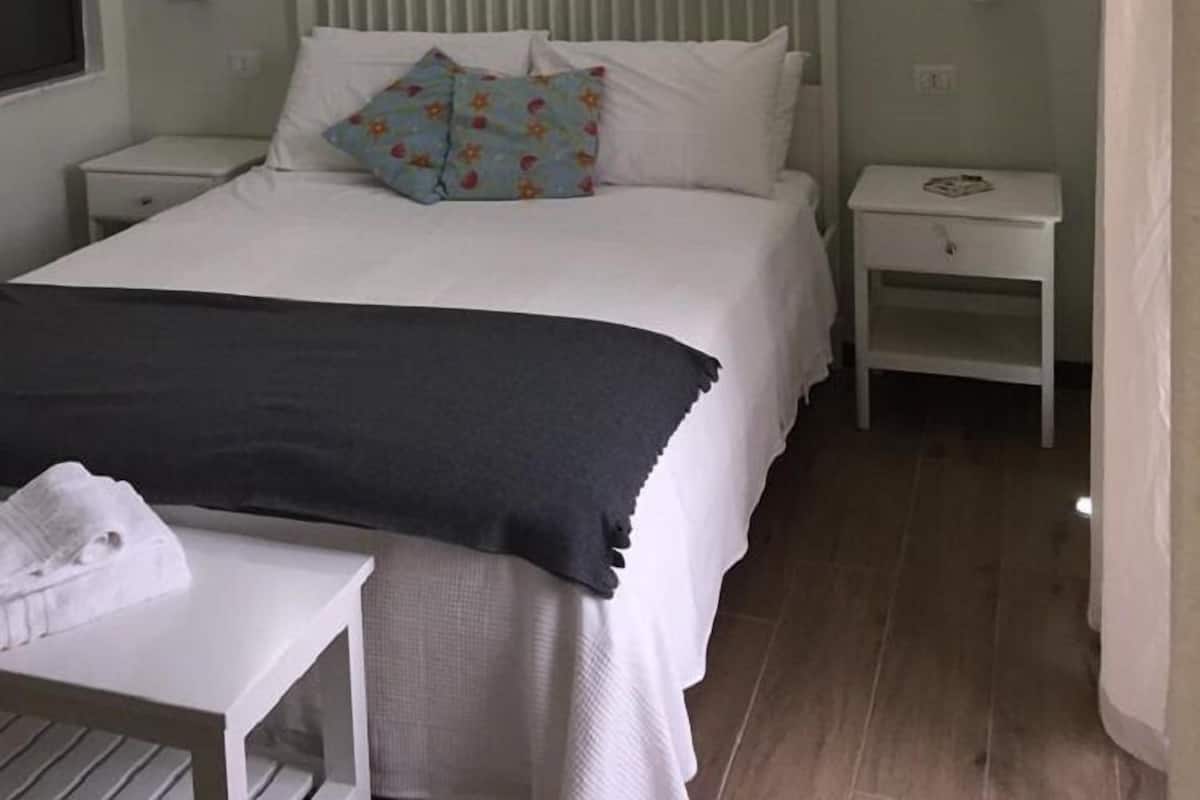 Desk, blackout curtains, soundproofing, iron/ironing board