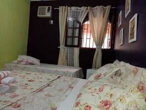 Chambre Triple | 1 chambre, minibar, rideaux occultants, lits pliants/supplémentaires