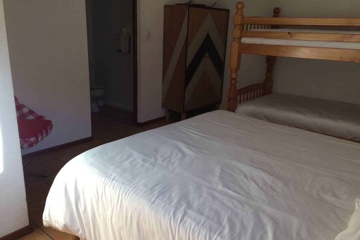 standard quadruple room | blackout curtains, bed sheets, wheelchair access