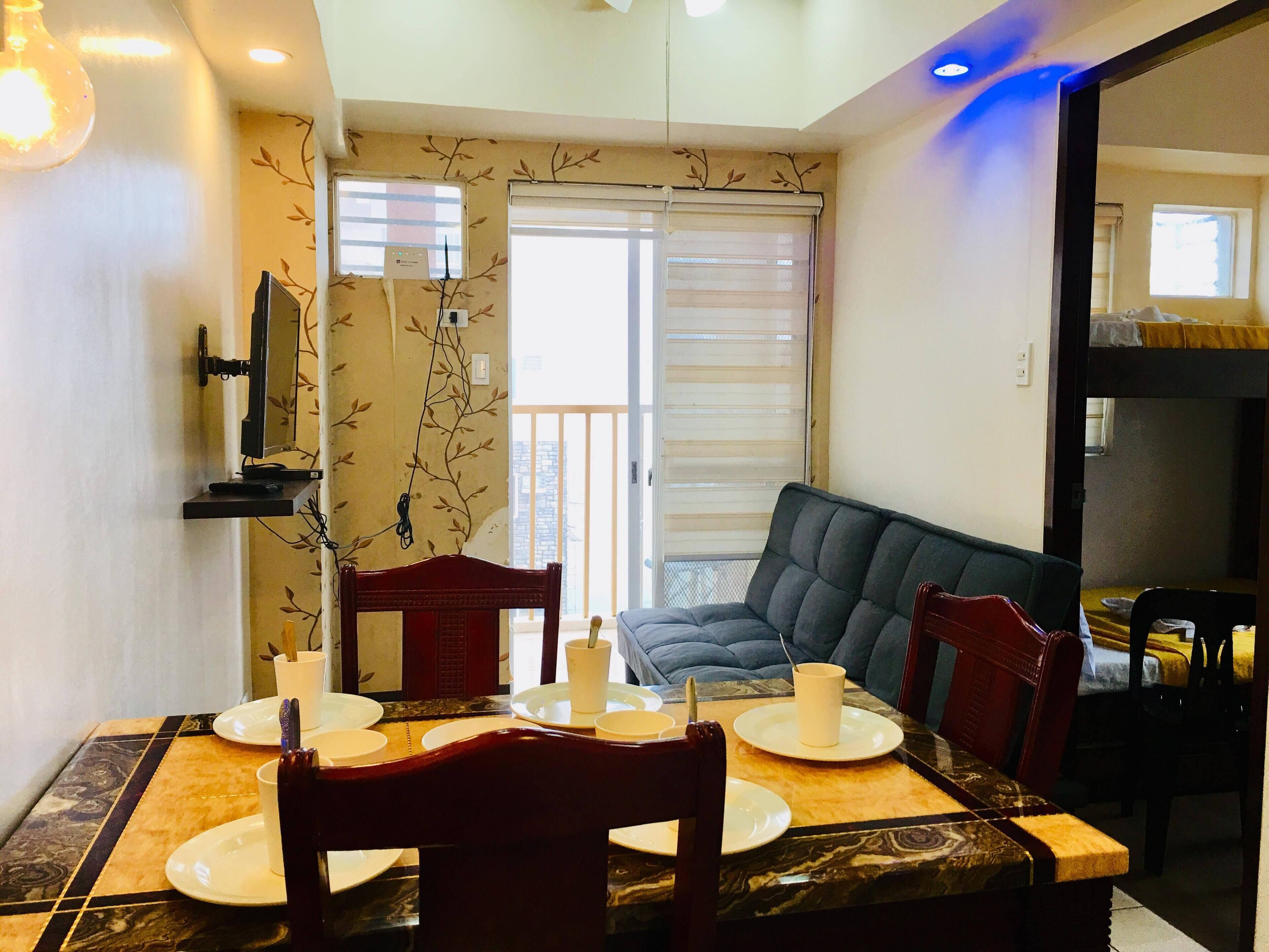 Executive 2BR condominium | Desk, iron/ironing board, free WiFi, bed sheets