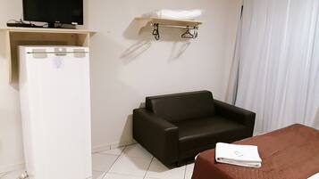 Suite Premium  | Frigobar, ferros/tábuas de passar roupa, Wi-Fi de cortesia