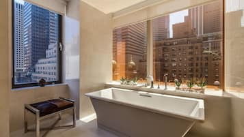 Deluxe Suite, Multiple Beds | Bathroom | Designer toiletries, hair dryer, towels
