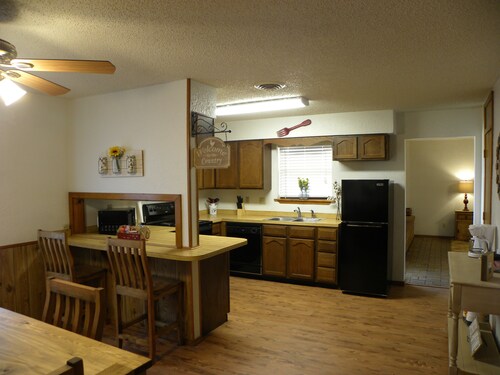 Country Haven has 3 bedrooms and 2 baths. A kitchen, living room and dining.