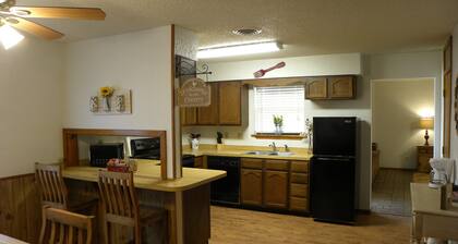 Country Haven has 3 bedrooms and 2 baths. A kitchen, living room and dining.