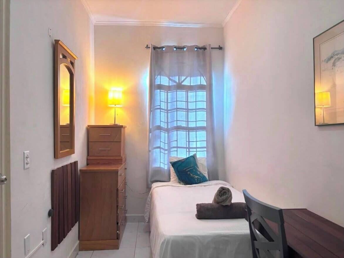 Habitación individual | Sábanas de algodón egipcio y ropa de cama de alta calidad