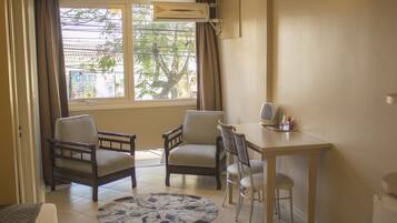 Executive Room | Living area | TV