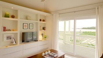 Deluxe Apartment, 2 Bedrooms, Ocean View | Living room | Smart TV