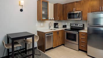 Suite, 1 Bedroom | Private kitchen | Full-size fridge, microwave, stovetop, coffee/tea maker