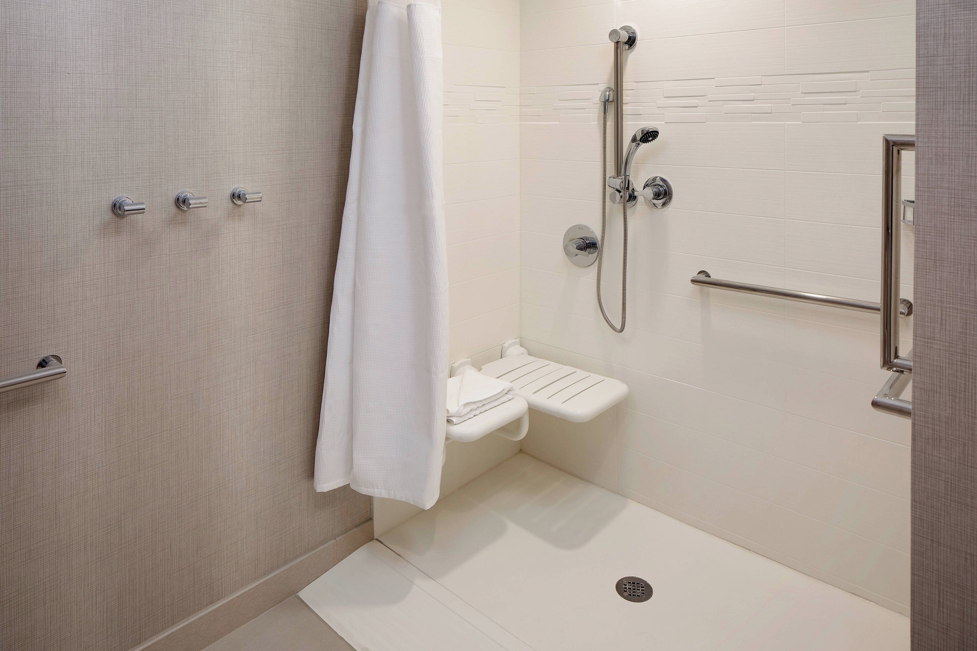 combined shower/bathtub, free toiletries, hair dryer, towels