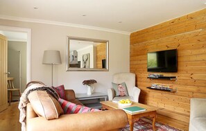 Chaumière | Aire de séjour | Téléviseur à écran plat, lecteur de DVD, films payants