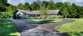 Spacious Home nestled along the Blackberry River in Northwest CT