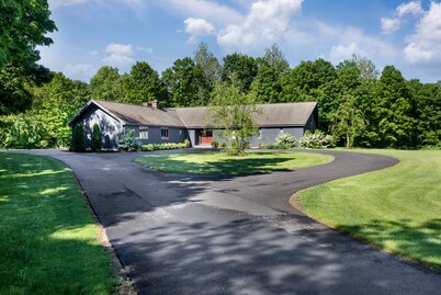 Spacious Home nestled along the Blackberry River in Northwest CT