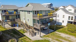 Exterior - Experience ocean views from this spacious 4-bedroom second row home in Surf City! (Surf City)