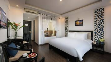 Deluxe Suite, 1 King Bed, Pool View | Minibar, in-room safe, individually decorated, individually furnished
