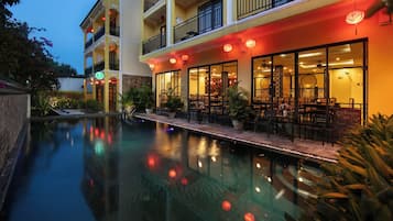 Outdoor pool, open 9:00 AM to 9 PM, pool umbrellas, sun loungers