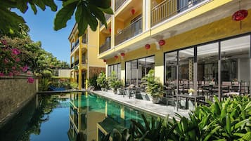 Outdoor pool, open 9:00 AM to 9 PM, pool umbrellas, sun loungers