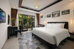 Deluxe Suite, 1 King Bed, Pool View | Minibar, in-room safe, individually decorated, individually furnished - Hoi An Golden Holiday Villa (Da Nang)