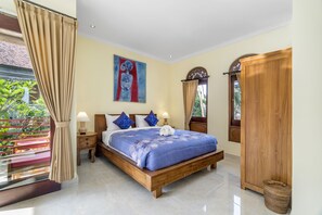 Habitació familiar, diversos llits, terrassa, vistes al jardí | Escriptori, llits addicionals i wifi gratuïta 