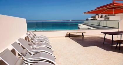 *HOTEL SERVICE* LUXURY 2 BEDROOM CONDO AT LEVENT ON EAGLE BEACH