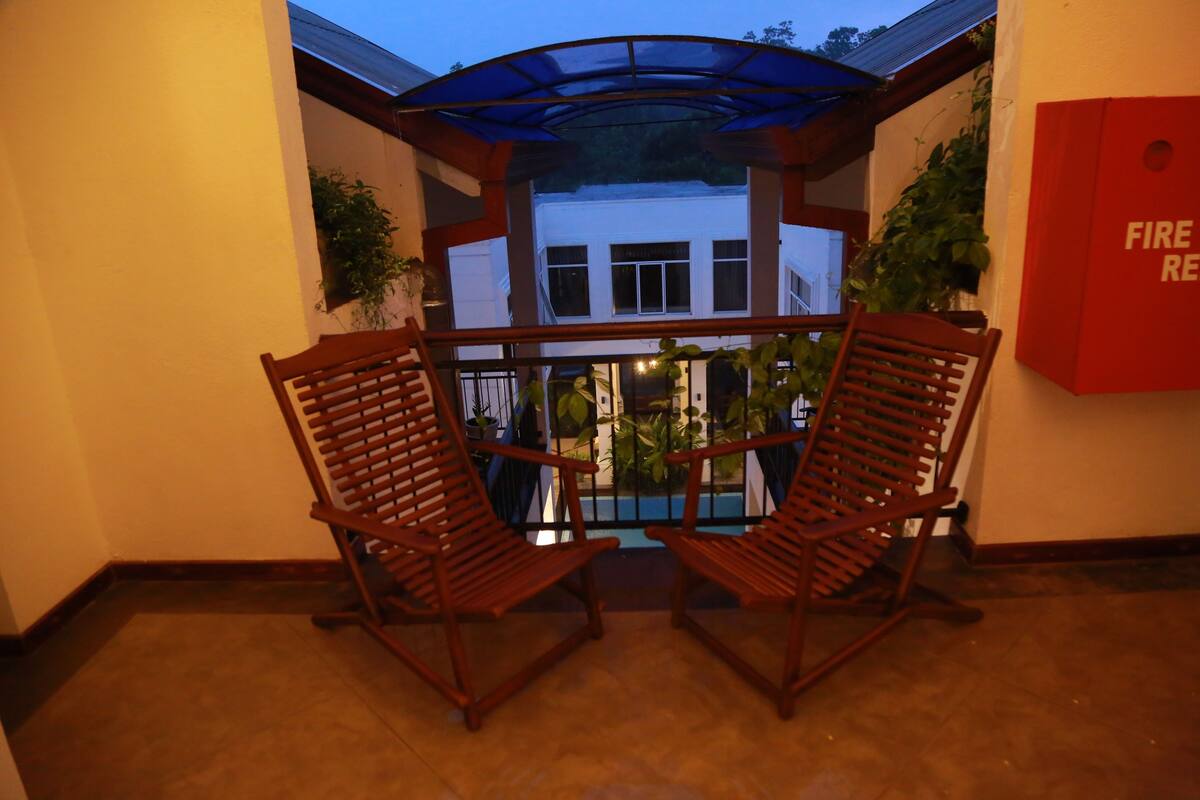 Family Triple Room, 1 Bedroom, Smoking, Pool View | Minibar, in-room safe, desk, soundproofing